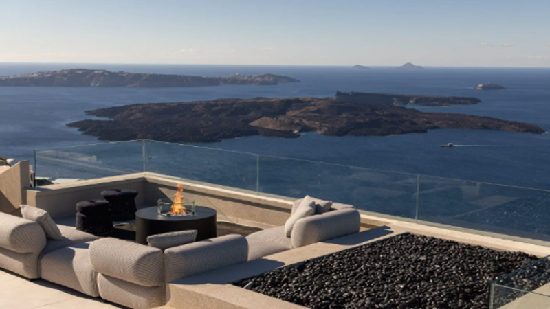 Stunning architectural rendering of custom premium property in Greece & Aegean Sea (Santorini Hillside Villas) with overlaid cryptographic ledger metrics.