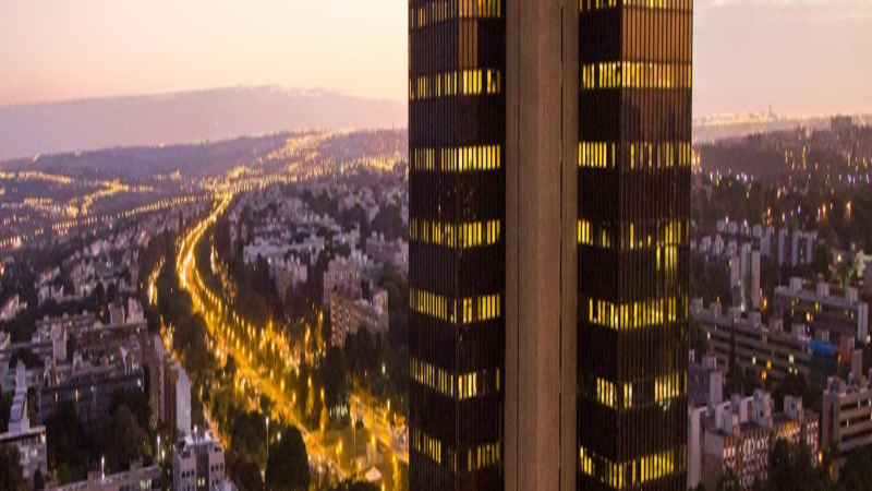 A digital financial bridge connecting the South American continent to global clearinghouses, visualizing the flow of stablecoins and tokenized assets on Euroclear's DLT infrastructure.
