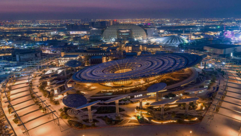 Industrial rendering of Nouadhibou's deep-water port in Mauritania, featuring LNG tankers and commercial fishing fleets overlaid with global blockchain network connections.